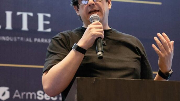 Man speaks at REBS Guadalajara event.