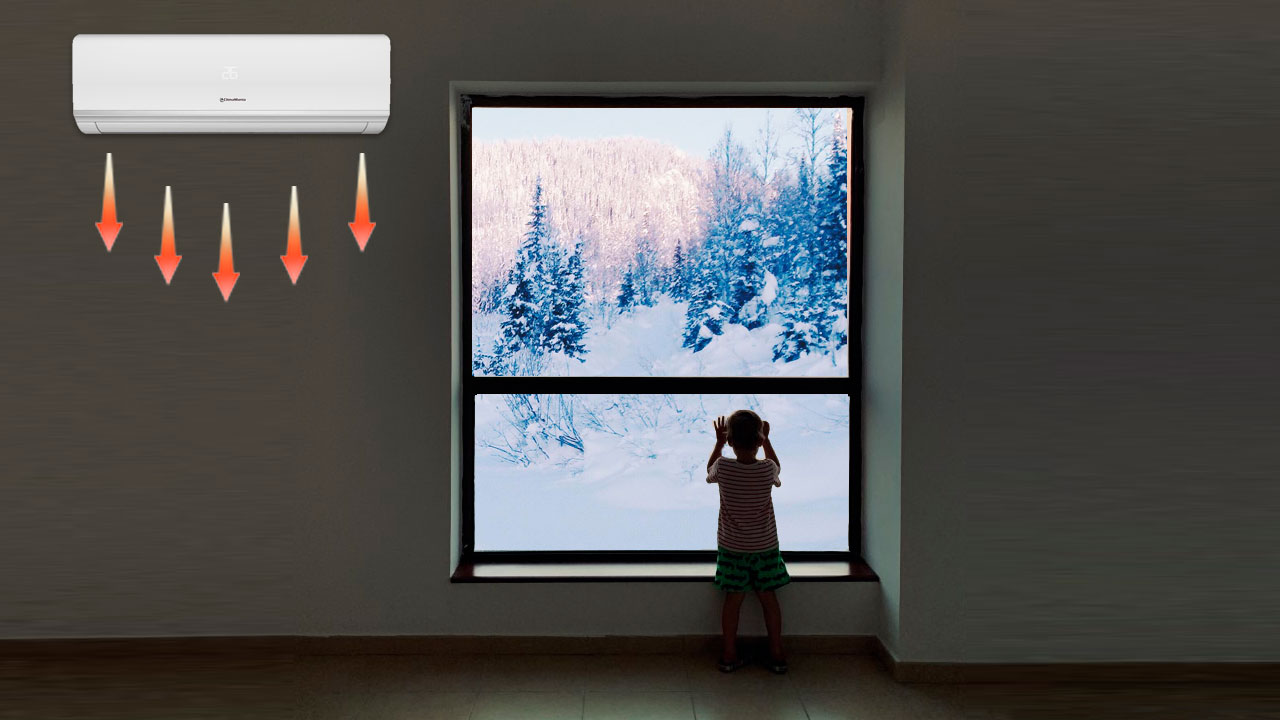 Sponsors/branding.

Niño observa paisaje nevado desde ventana con aire acondicionado Trane. Solución de climatización para el sector real estate en México.