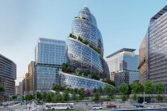 Edificio innovador Amazon Nova: diseño en espiral con vegetación integrada. Arquitectura tecnológica inmobiliaria que redefine el paisaje urbano.