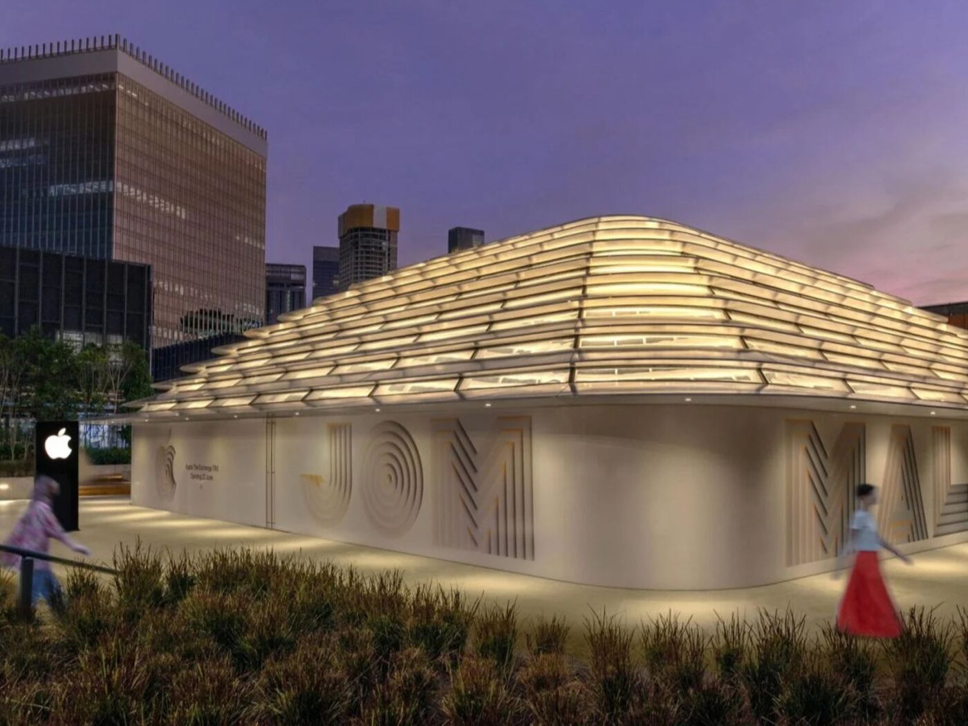 Nueva tienda Apple Kuala Lumpur: Diseño innovador con fachada iluminada y vegetación. Apple llega a Malasia, experiencia tecnológica única.