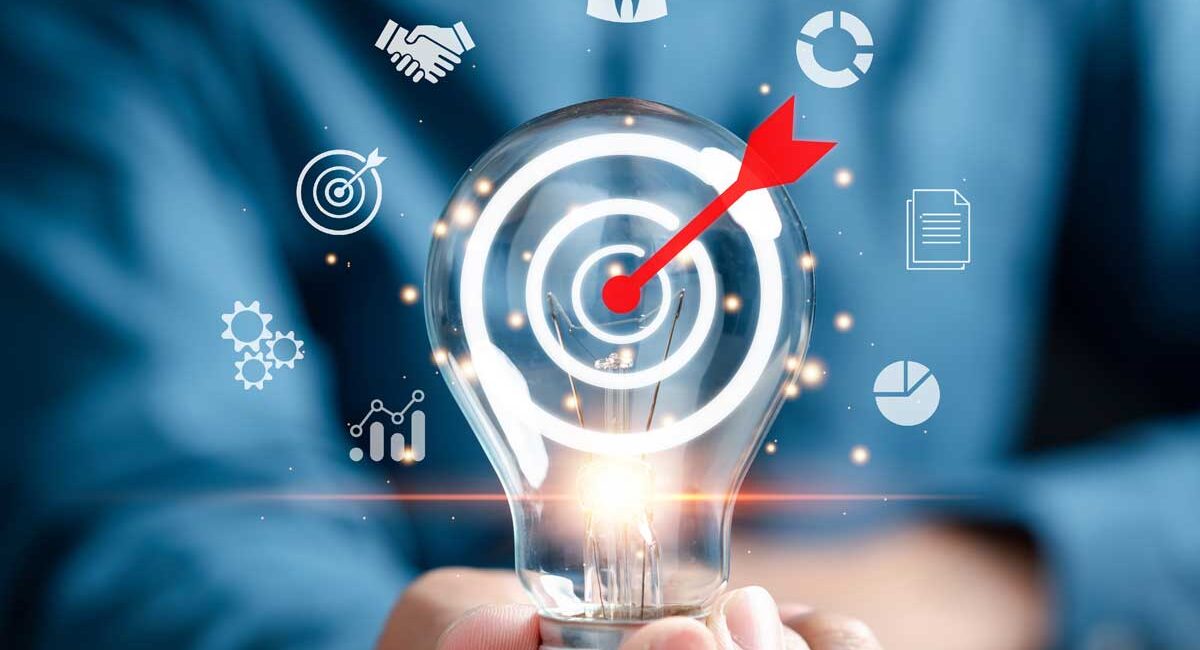 Sponsors/branding.

Foco con diana y flecha, simbolizando el éxito en Inmobiliare Summits. Imagen conceptual para la conferencia de real estate en México, LATAM.