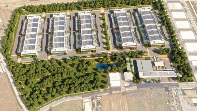 Vista aérea del portafolio de Thor Urbana, mostrando nueve inmuebles en México. Arquitectura moderna con paneles solares y áreas verdes. Expansión inmobiliaria.