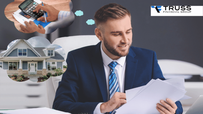 Un hombre de negocios revisa documentos en su escritorio, pensando en finanzas y una casa. Logo de Truss Financial Group visible.