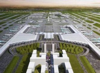 Vista aérea del Aeropuerto Internacional Felipe Ángeles (AIFA), un proyecto que impacta el sector inmobiliario. Diseño moderno y gran escala.