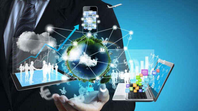 Hombre con tecnología: laptop, tablet, móvil y globo terráqueo. Representa el rol de la tecnología en la experiencia profesional global.