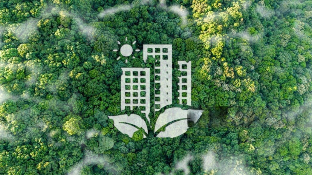 Real Estate sostenible: Ícono de edificios blancos con hojas sobre un frondoso bosque verde. Simboliza estrategias de sostenibilidad en el sector.
