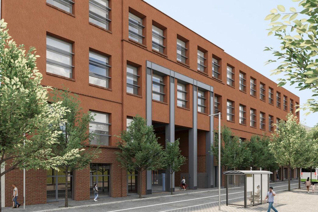 Edificio residencial en Barcelona con diseño moderno y fachada de ladrillo. Inversión de Barings y Salas en el mercado inmobiliario catalán.