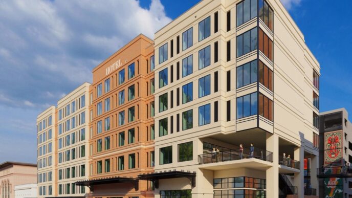 Visualización arquitectónica de un hotel moderno en Georgia, reflejando el auge del retail y el real estate comercial. Fachada elegante con detalles.