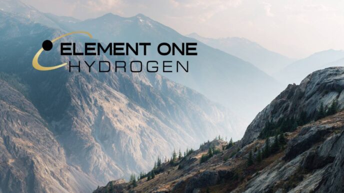 Paisaje montañoso con logo de Element One Hydrogen, representando la energía limpia en Columbia Británica. Innovación y sostenibilidad en hidrocarburos.