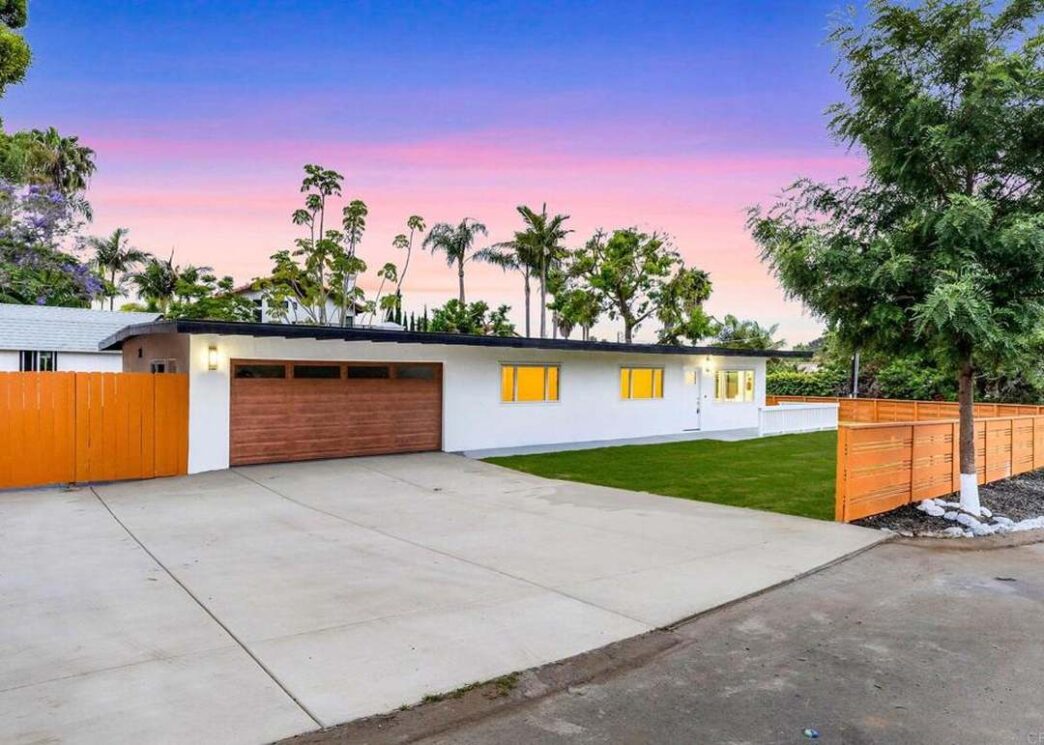 venue/architecture
Casa moderna en Puebla, México, con garaje de madera y valla naranja. Diseño inmobiliario para el futuro. Inmobiliare Summits.