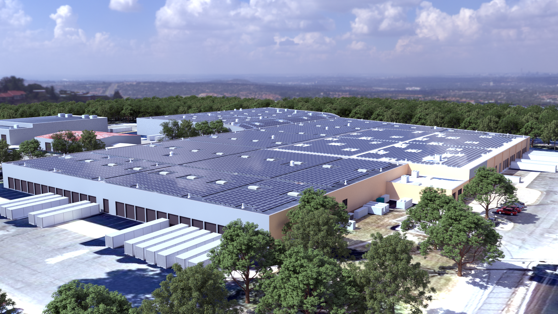 Vista aérea de un edificio con paneles solares en el techo, mostrando el impacto en la sostenibilidad inmobiliaria del sistema solar de UNFI.