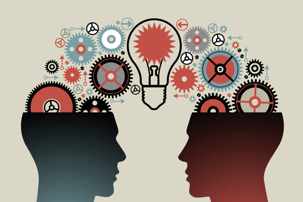 Ilustración de dos cabezas con engranajes y una bombilla, simbolizando ideas y colaboración. Inmobiliare Summits, real estate, conference.