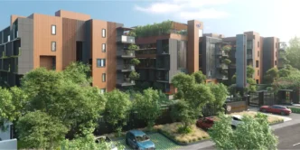 Edificio residencial de alta gama en Bengaluru, que muestra innovación y sostenibilidad en Real Estate. Arquitectura moderna integrada con vegetación exuberante.