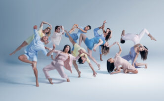 The image does not fit any of the categories provided.

Here's the alt text:

Grupo de bailarines en movimiento coordinado. Diseño y arte del Museo Yancuic en México. Bienal Mexicana.