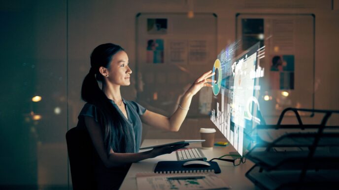 Headshot.

Mujer interactúa con datos digitales. Tecnología innovadora en análisis. Ideal para Inmobiliare Summits, conferencia de real estate en LATAM.