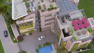 Vista aérea de edificio proptech en Nigeria. Diseño moderno con piscina, terrazas y vegetación. Representa innovación y crecimiento inmobiliario.