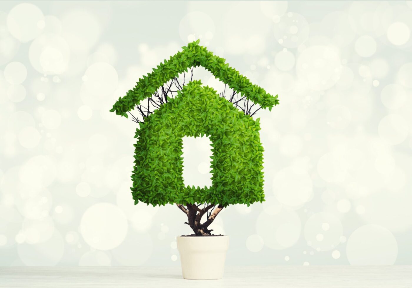 Casa verde en maceta, representando la sostenibilidad en el sector inmobiliario de lujo. Nueva era de construcciones ecológicas y sostenibles.