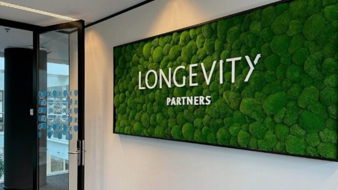 venue/architecture
Muro verde con el logo Longevity Partners en un espacio de Inmobiliare Summits. Diseño moderno en un venue de la conferencia real estate.