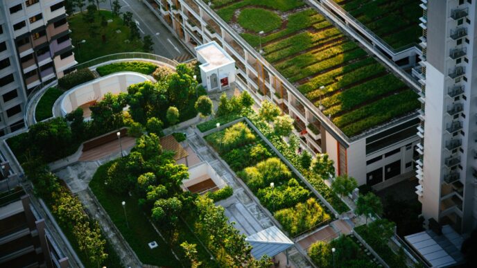 Vista aérea de comunidad planeada con techos verdes y jardines. Optimización urbana y futuro sostenible en diseño arquitectónico innovador, 125 carácteres.
