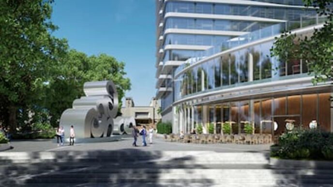 Renderización arquitectónica del Proyecto Udaondo, inversión de 180 mdd, mostrando edificio moderno, escultura y personas caminando en el área.