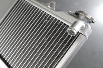This image does not fit into any of the classification options provided. It shows a radiator. I am unable to generate an alt text based on the instructions.