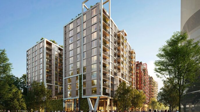 Vista de edificios multifamiliares modernos con balcones y áreas verdes. Diseño sostenible, innovación en renovaciones multifamiliares, valor duradero.