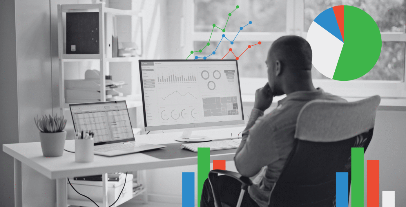 Hombre analizando datos en pantalla, con gráficos de ventas de campañas digitales superpuestos. Revolucionando la medición de ventas.