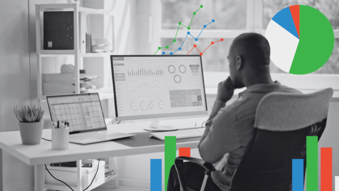 Hombre analizando datos en pantalla, con gráficos de ventas de campañas digitales superpuestos. Revolucionando la medición de ventas.