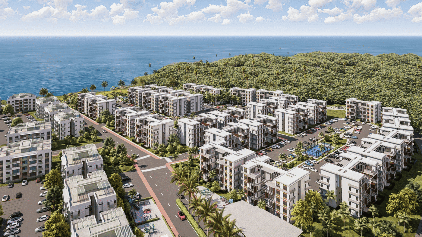 Vista aérea de Riviera del Este, proyecto residencial de lujo de Grupo BP. Modernos edificios blancos con balcones frente al mar Caribe.