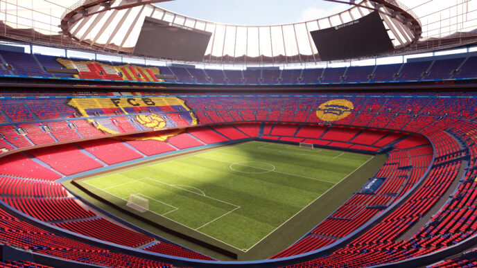 Vista del Spotify Camp Nou, el nuevo estadio del FC Barcelona. Se aprecian las gradas rojas y azules, el campo de juego y la estructura del techo.