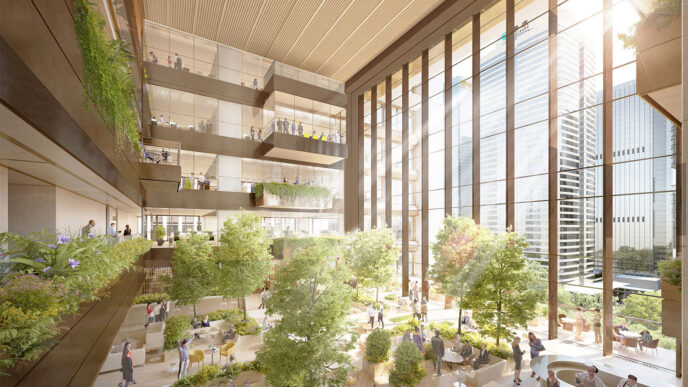 Interior de la Torre Z6 Net Zero en China: Oficinas ecológicas con vegetación exuberante, luz natural y personas trabajando. Diseño arquitectónico innovador.