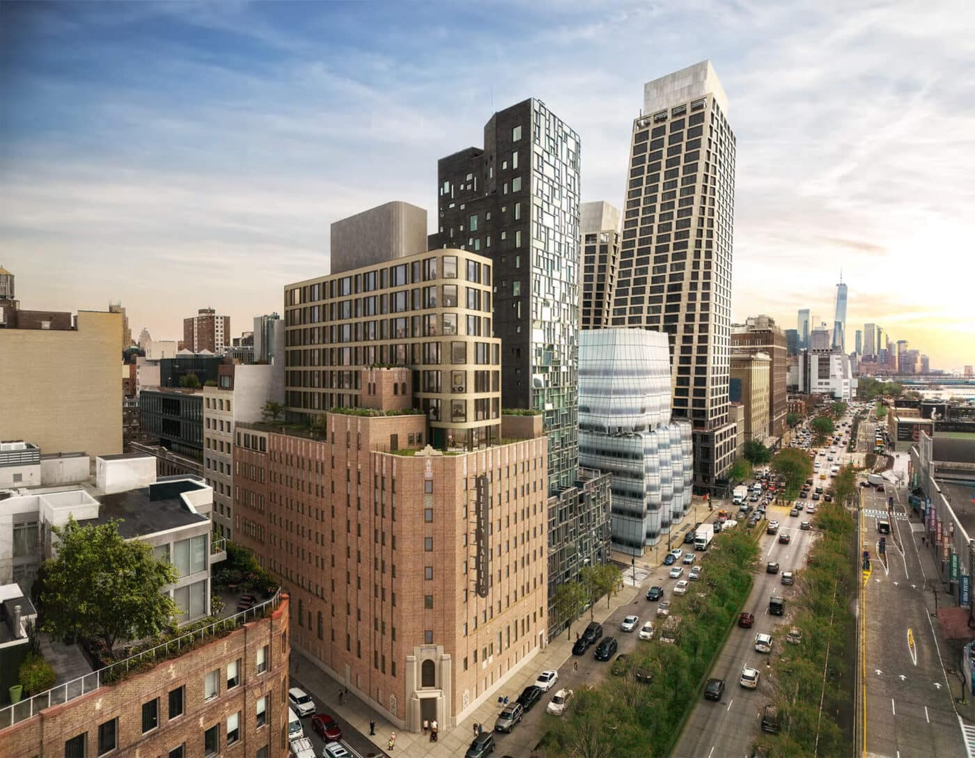 Vista aérea de Nueva York mostrando la transformación de una correccional en vivienda asequible. Edificios altos dominan el paisaje urbano.