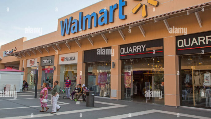 Venue/architecture.

Edificio comercial con tiendas como Walmart y Quarry. Arquitectura urbana en ciudad. Marcas visibles.