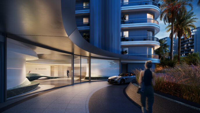 Renderización de la Torre Le Schuylkill en Mónaco, diseño de Zaha Hadid Architects tras la renovación. Vista exterior con coche y vegetación.
