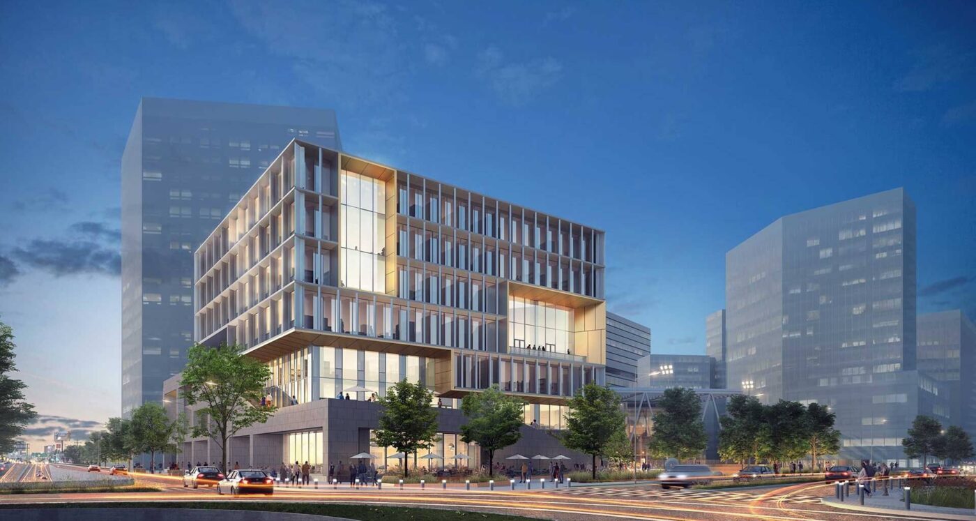 Vista arquitectónica de Expedition FEMSA, hub científico-tecnológico en Monterrey. Edificio moderno con ventanales y entorno urbano dinámico.