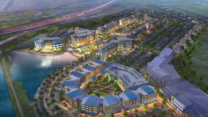 Vista aérea del desarrollo mixto University Village en Boca Ratón, con área comercial, residencial y centro de transporte. Imagen ilustrativa.