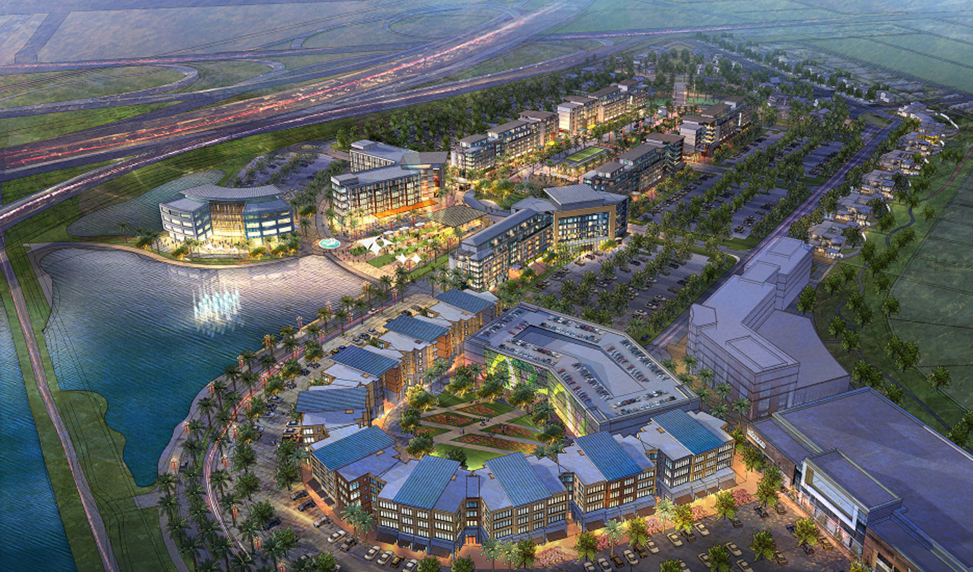 Vista aérea del desarrollo mixto University Village en Boca Ratón, con área comercial, residencial y centro de transporte. Imagen ilustrativa.